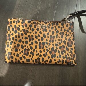Kate Spade, New York leopard print bifold wallet.